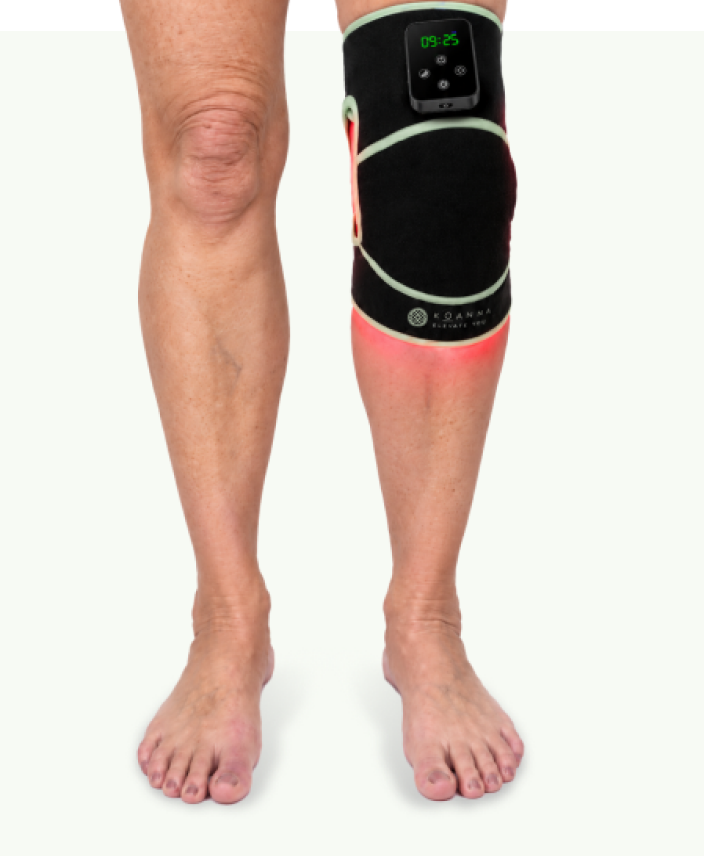 Bein mit Koanna Rotlicht-Bandage am Knie